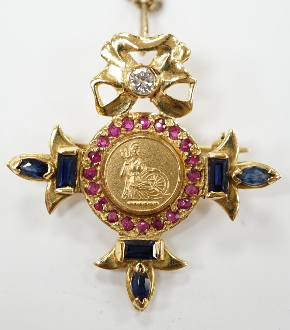 A modern 18ct gold, ruby, sapphire and diamond set brooch, depicting Brittania, 30mm, gross weight 6.3 grams. Condition - fair to good